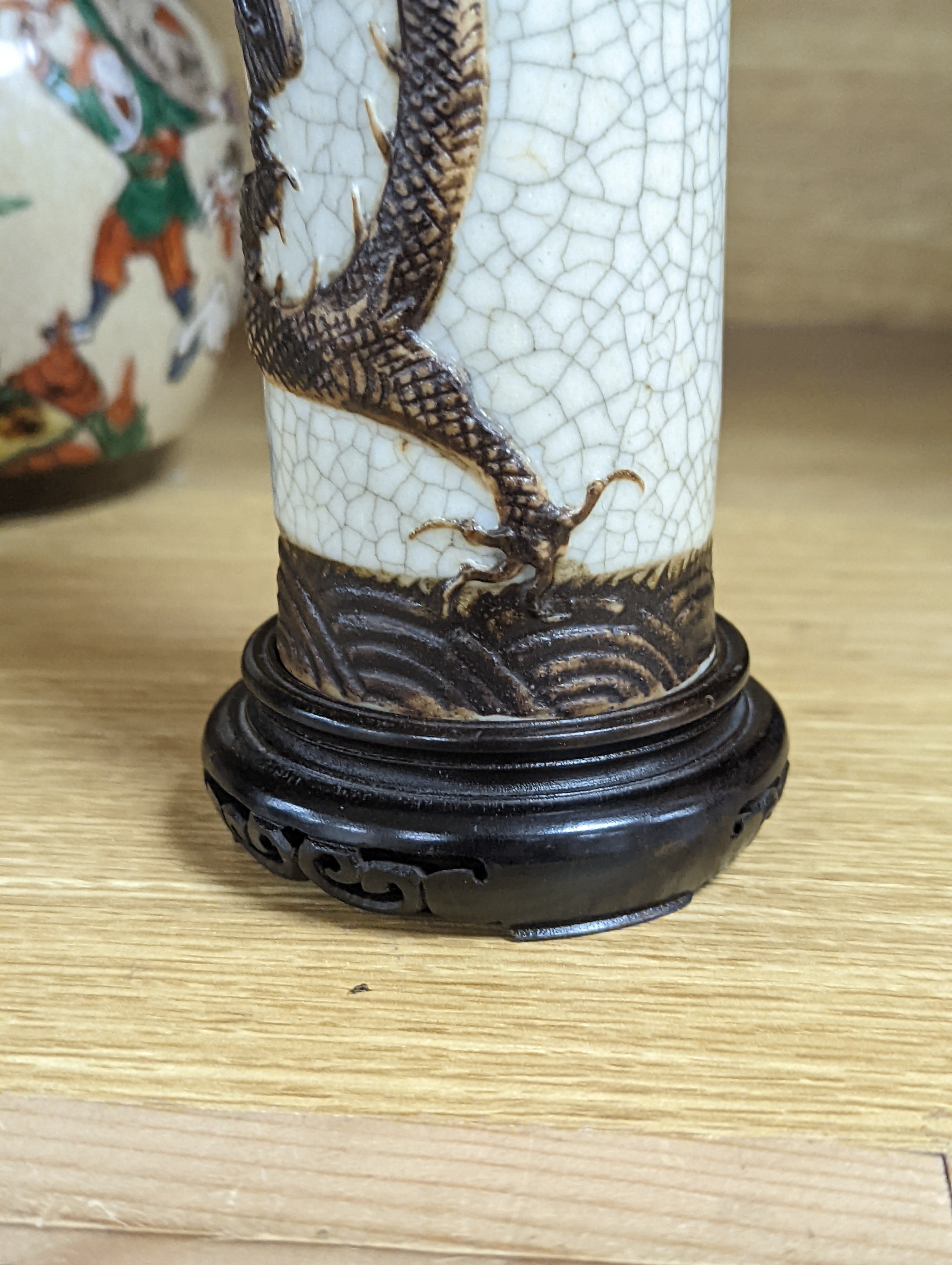 A Chinese famille verte crackle glaze jar and cover, 14.5cm, two famille rose dishes and a crackle glaze ‘dragon’ vase, all late 19th/early 20th century
